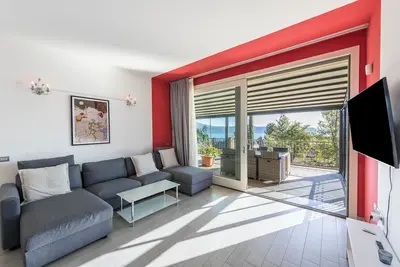 Image de Appartement 'Résidence Virgilio Red' avec vue sur le lac, Wi-Fi et climatisation.