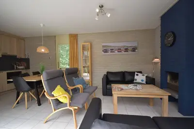 Image de Bungalow avec cheminée, dans un parc de vacances