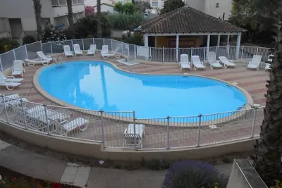 Image de Appartement 6 pers. , avec clim, piscine, garage, vue sur lac, terrasse & Wi-Fi