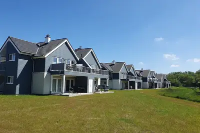 Image de Meerfreude - close to the beach and the North Sea, fireplace, balcony, infrared sauna