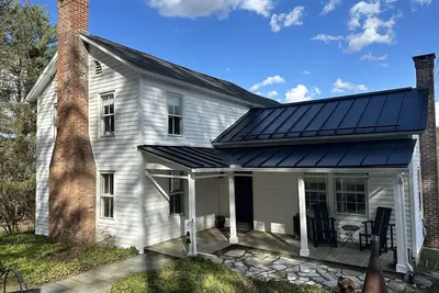 Image de Restored historic farmhouse on 25 private acres