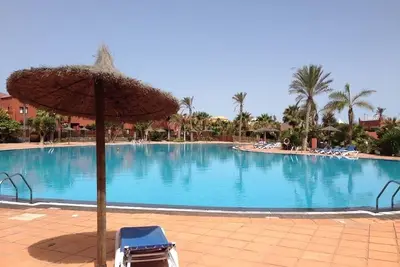 Image de Appartement dans un beau complexe avec palmiers et grandes piscines