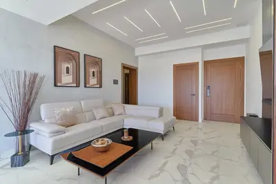 Image de Cozy 3 bedroom Apt/Outdoor Pool/Gym/parking space