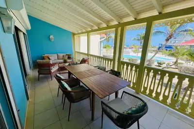 Image de Splendide appartement Ă la Baie Orientale. Vue mer. Grande piscine. Citerne.