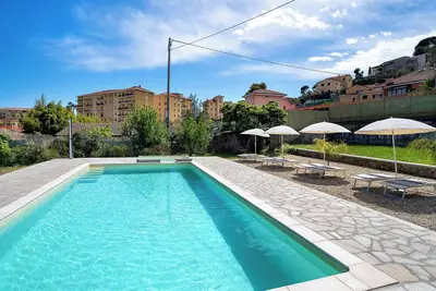 Image de Maison de vacances 'Il Gattino Di Porto Appartamento 3' avec piscine partagée