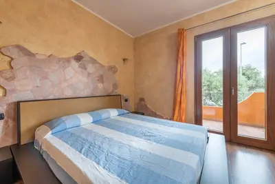 Image de Maison de vacances 'Villetta Norma A 5 Minuti Dal Mare' avec jardin, terrasse et Wi-Fi