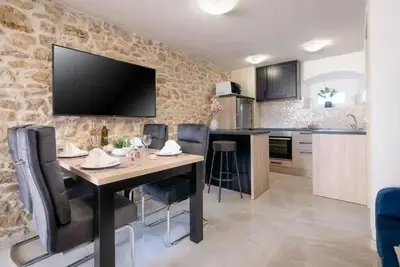 Image de Maison de vacances Kastelir pour 1 - 4 personnes avec 2 chambres à coucher - Maison mitoyenne