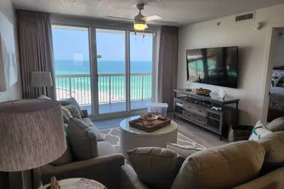 Image de Enjoy breathtaking ocean and beach views, with the sand just steps away.