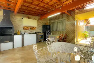 Image de Excellent house 5 minutes from Enseada Beach | Barbecue and Wi-Fi