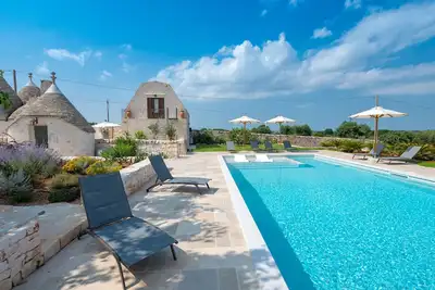 Image de Villa \"Acres Itria\" avec piscine privée, Wi-Fi et climatisation