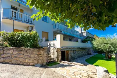 Image de Appartement sur la plage avec WiFi et climatisation