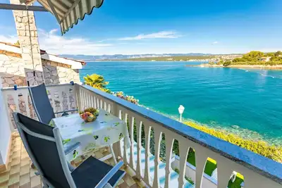 Image de Appartement pour 4-5 personnes a la plage, avec WiFi et climatisation
