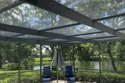 Image de Peaceful pool home with water views