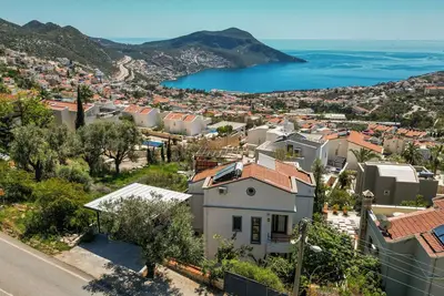 Villa Kirlangic is an 8 person villa in the center of Kalkan with sea view.