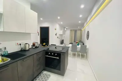 Image de Central Cozy Located Apt