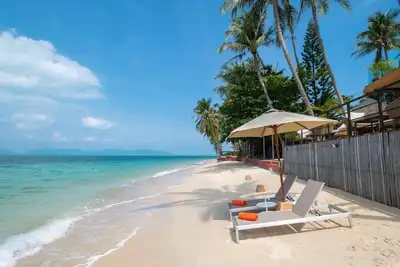 Family beach cottage \nin a fully managed villa resort on the best beach of Samui