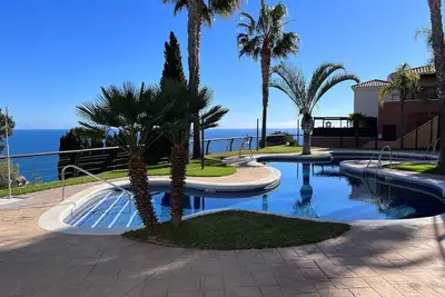 Image de Appartement de vacances \"Vistamar\" avec vue sur la mer, piscine partagée et Wi-Fi