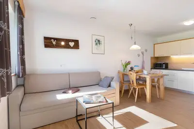 Image de Appartement de vacances \"Stiflerhof Apt Enzian\" avec vue sur les montagnes, jardin partagé et Wi-Fi