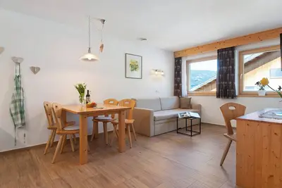 Image de Appartement de vacances \"Stiflerhof Apt Arnika\" avec vue sur montagne, balcon et Wi-Fi