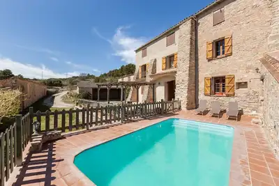 Image de Maison de vacances 'El Cup' avec vue sur les montagnes, piscine partagée et Wi-Fi
