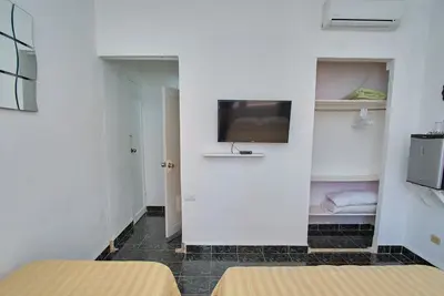 Hermosa casa con terraza piscina y Wi-Fi