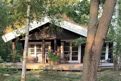 Image de Log house near a child-friendly sandy beach