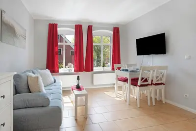 Image de Appartement de vacances 'Kapitänsferienhaus Admiralität' avec terrasse partagée et Wi-Fi