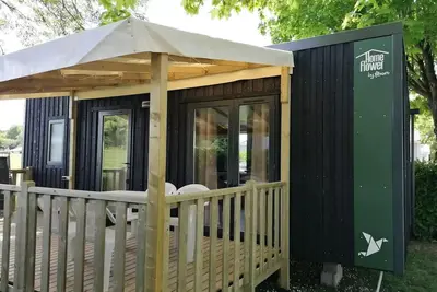 Image de Mobilheim Cosy 29m2 Premium - 2 Schlafzimmer + überdachte Terrasse + Tv + Lv 4 Personen
