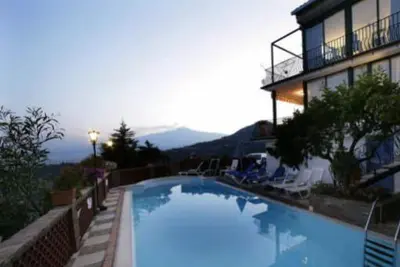 Image de Apartment Enrico with pool and amazing view of sea and Mt. Etna