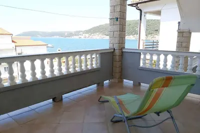 Image de Appartement de vacances avec amarrage pour bateau et vue sur la mer