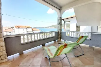Image de Appartement de vacances avec amarrage pour bateau et vue sur la mer