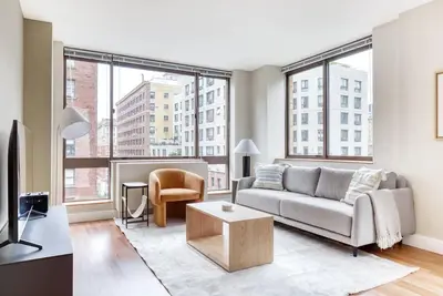Image de Sleek Uws 2br w/ Playroom & Rooftop, walk to Central Park, by Blueground