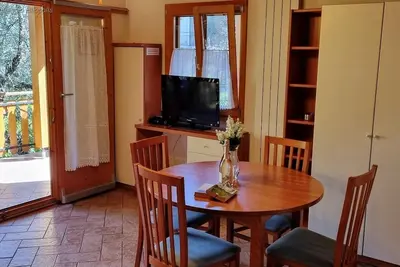 Image de Villaggio Heliopolis Cottage 84 with terrace 2 minutes  from the lake