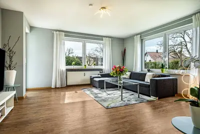 Image de Appartement 'Fewo Hotz Am Golfclub Lindau 2a' avec vue sur les montagnes, terrasse privée et Wi-Fi