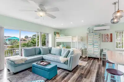 Image de Canal-front home with boat access, deck, grill, & washer\/dryer
