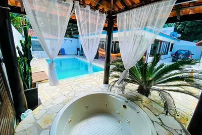 Image de Complete house in Maresias, 450m from the sand