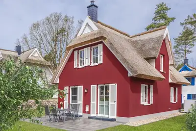 Image de Wolf's thatched house with sauna, terrace and garden - Thatched house