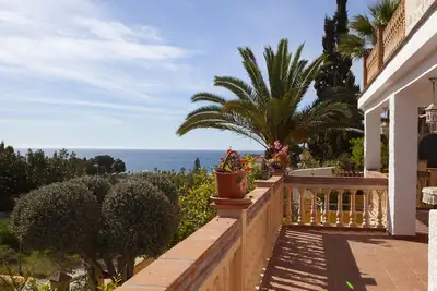Image de Holiday home a few steps to the beach. see view