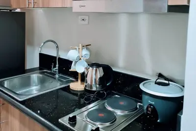 Image de Cozy 1-bedroom condo in lovely Pasay with WiFi, Ac