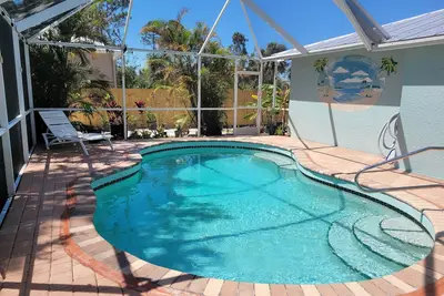 Image de Heated Pool & Spa Pet Friendly Tropical Home