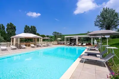 Image de Maison de vacances privée avec Wifi, climatisation, sauna, bain à remous, piscine, Tv, patio