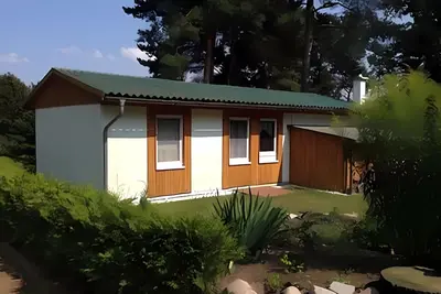 Image de House 1 with fireplace and rowing boat