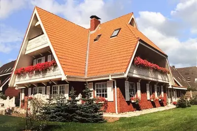 Image de Apartment with a view of the dyke for up to 4 people. (Opal)