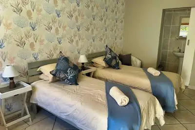 Image de Cozy Crner, une maison loin de chez soi, à seulement 100 mètres des plages immaculées