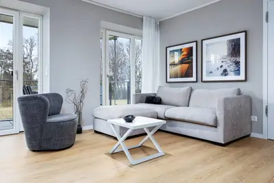 Image de Familienfreundliches Ferienapartment in Toplage am Meer mit Balkon & Zwei Bädern