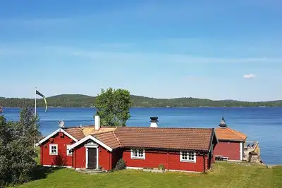 Image de A Cottage with spa, sauna and boat, see info