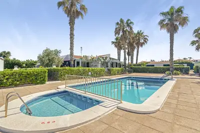 Image de Maison de vacances 'Sa Calma House' avec piscine partagée, terrasse privée et climatisation