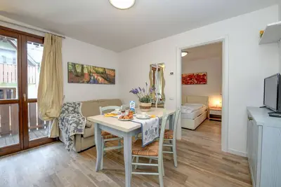 Image de Appartement 'Rosa delle Dolomiti Bilocale2' avec vue sur la montagne et Wi-Fi