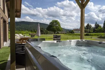 Image de Chalet Cocotte - 10 pers - Jacuzzi/Petanque/Baby-Foot - Ă 5min de Gerardmer