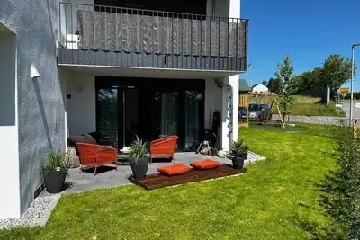 Image de New construction garden + terrace modern cozy apartment Aurora Friedrichshafen Bodensee